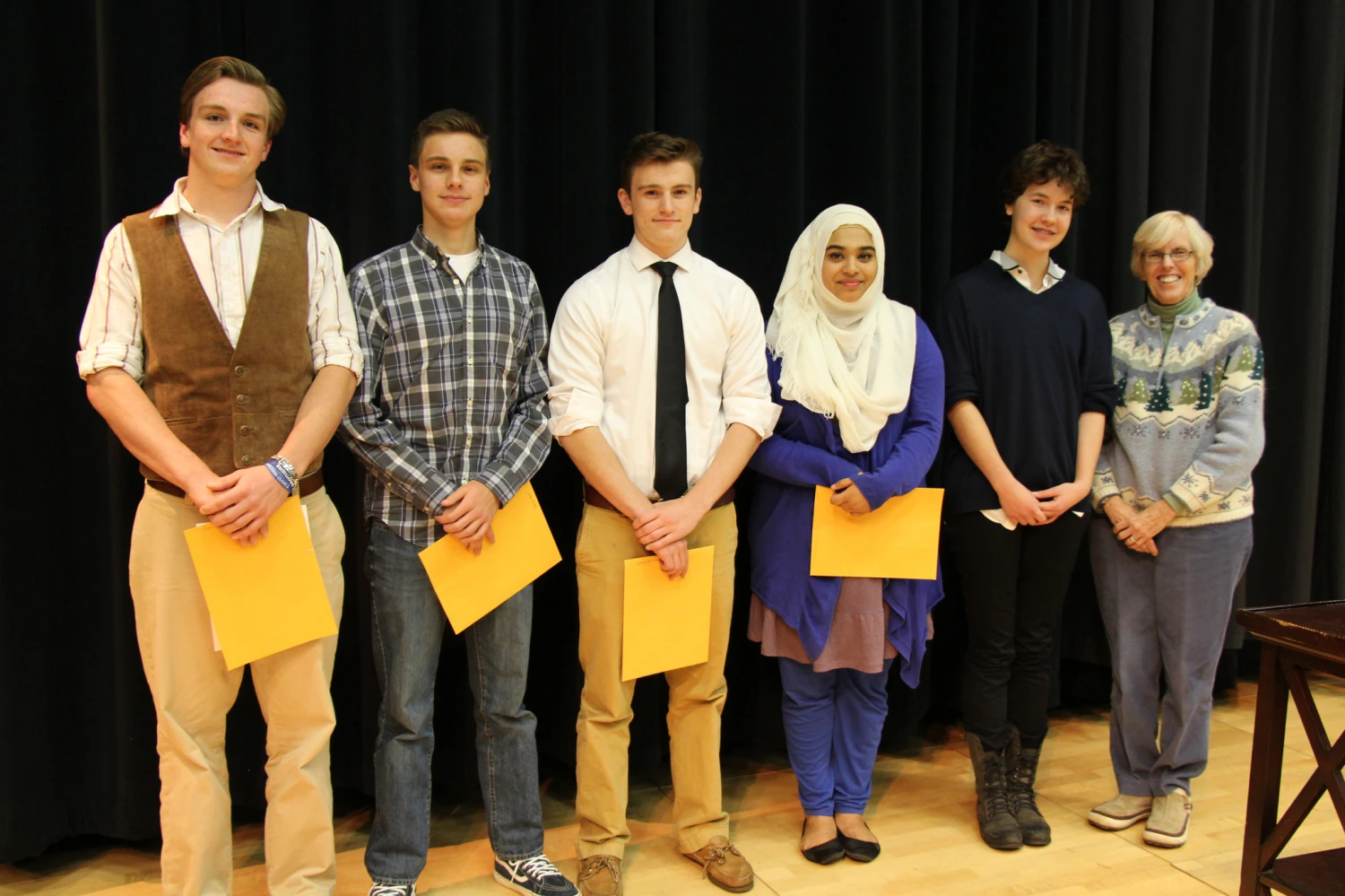 rom left to right: 1st place winner Jackson Graham, Honorable Mention winner Jack Evans, Honorable Mention winner Mitch VanAcker, 2nd place winner Nazifa Chowdhury, 3rd place winner Paulina Adams, and Center for Poetry Director Anita Skeen.