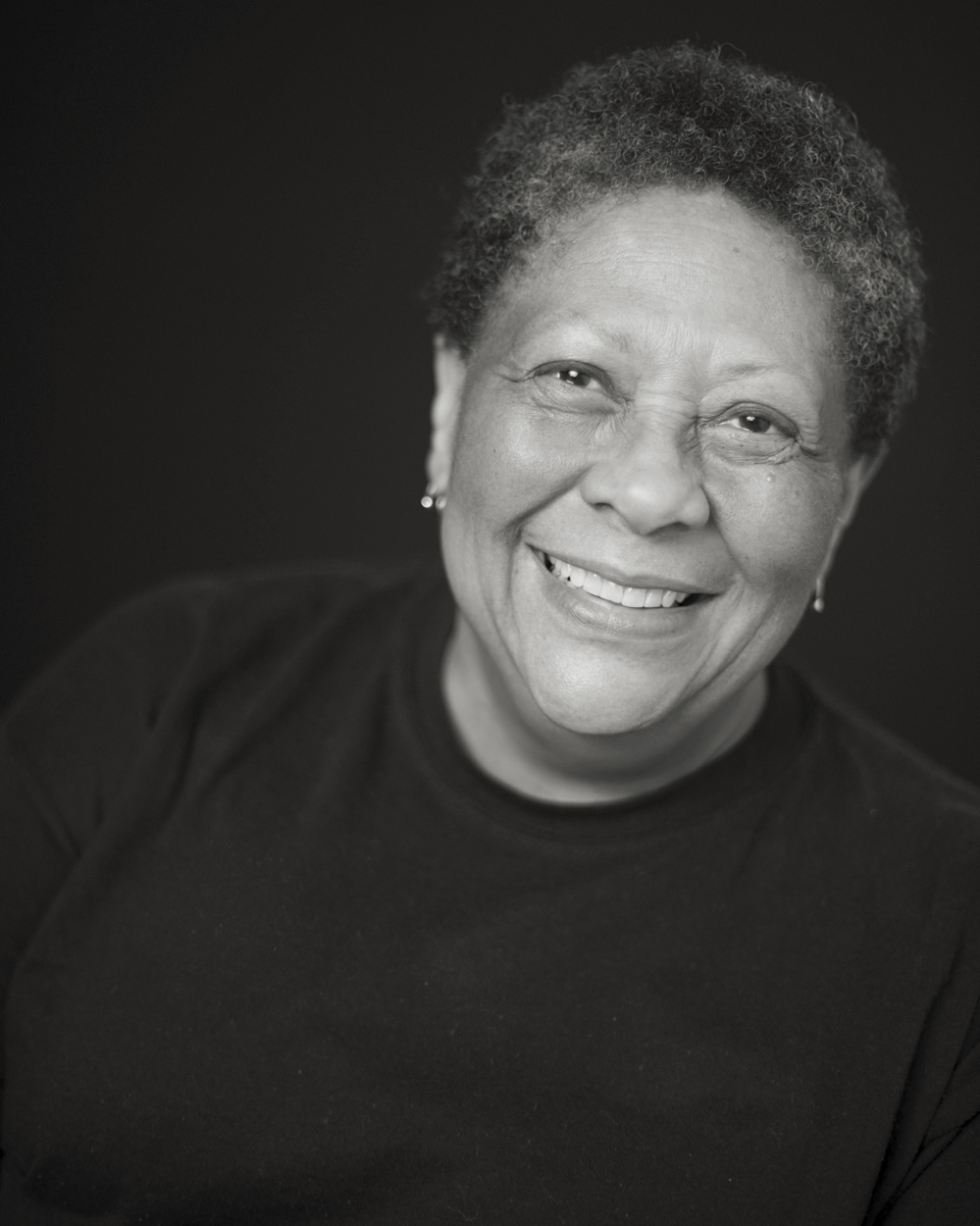 black and white image of woman smiling